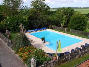 Heated pool at L Ecurie Holiday Home