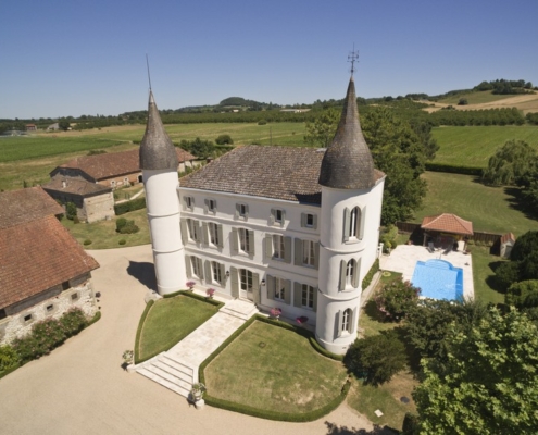 Aerial view of fairytale chateau set in countryside