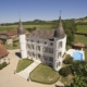 Aerial view of fairytale chateau set in countryside