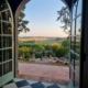 View through terrace doors of Saramon countryside